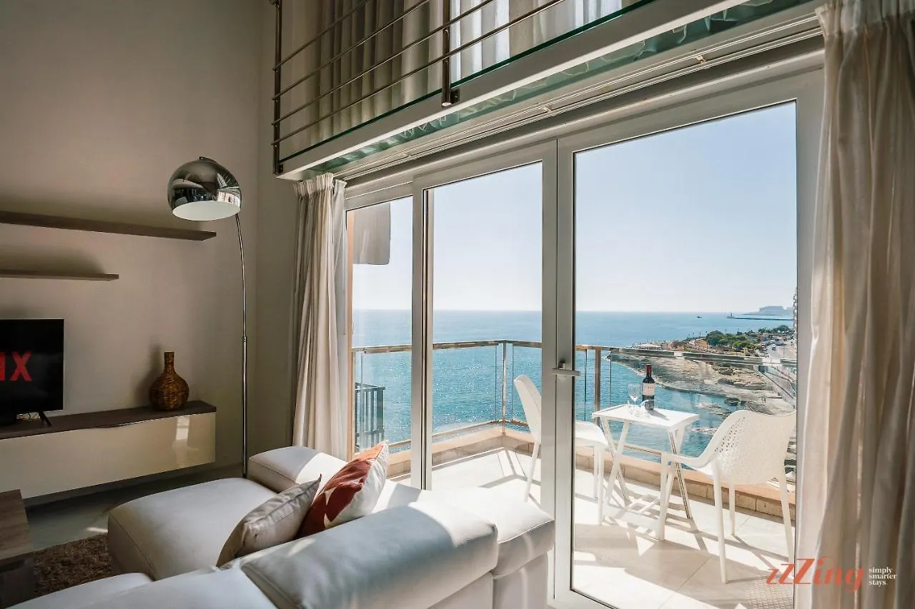 Scenic Seafront Duplex Apartment In Sliema